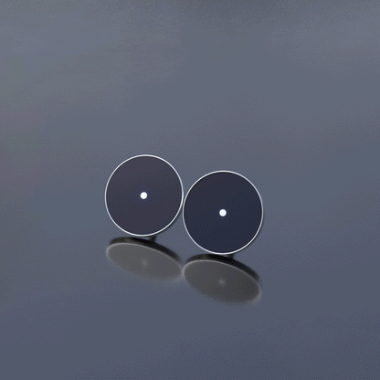 Stud earrings with motion image "Dots"