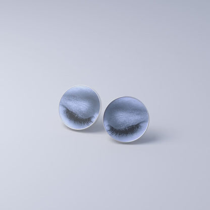 Stud earrings with motion image "eye"